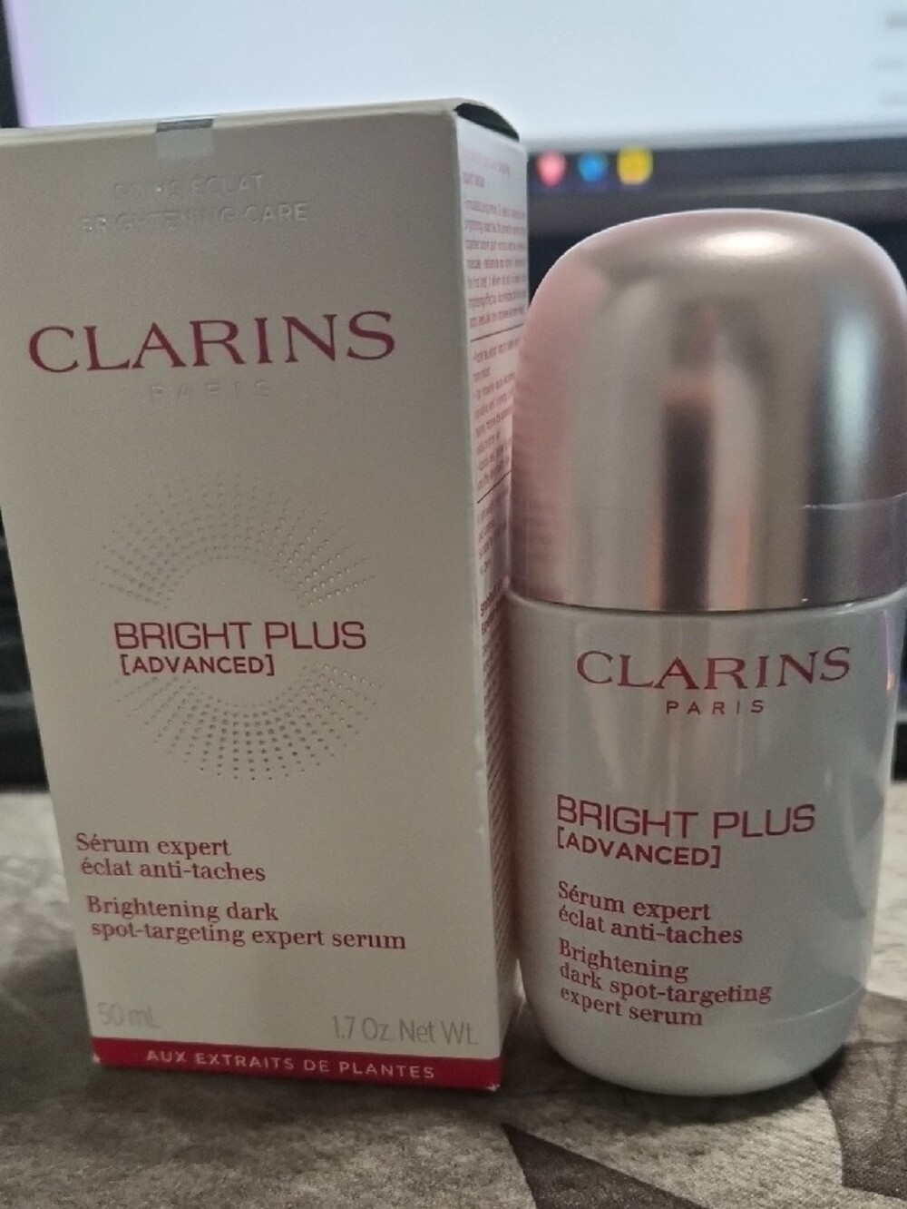 Clarins Bright Plus Advanced Brightening Serum White Box with Red Accents.1.7oz